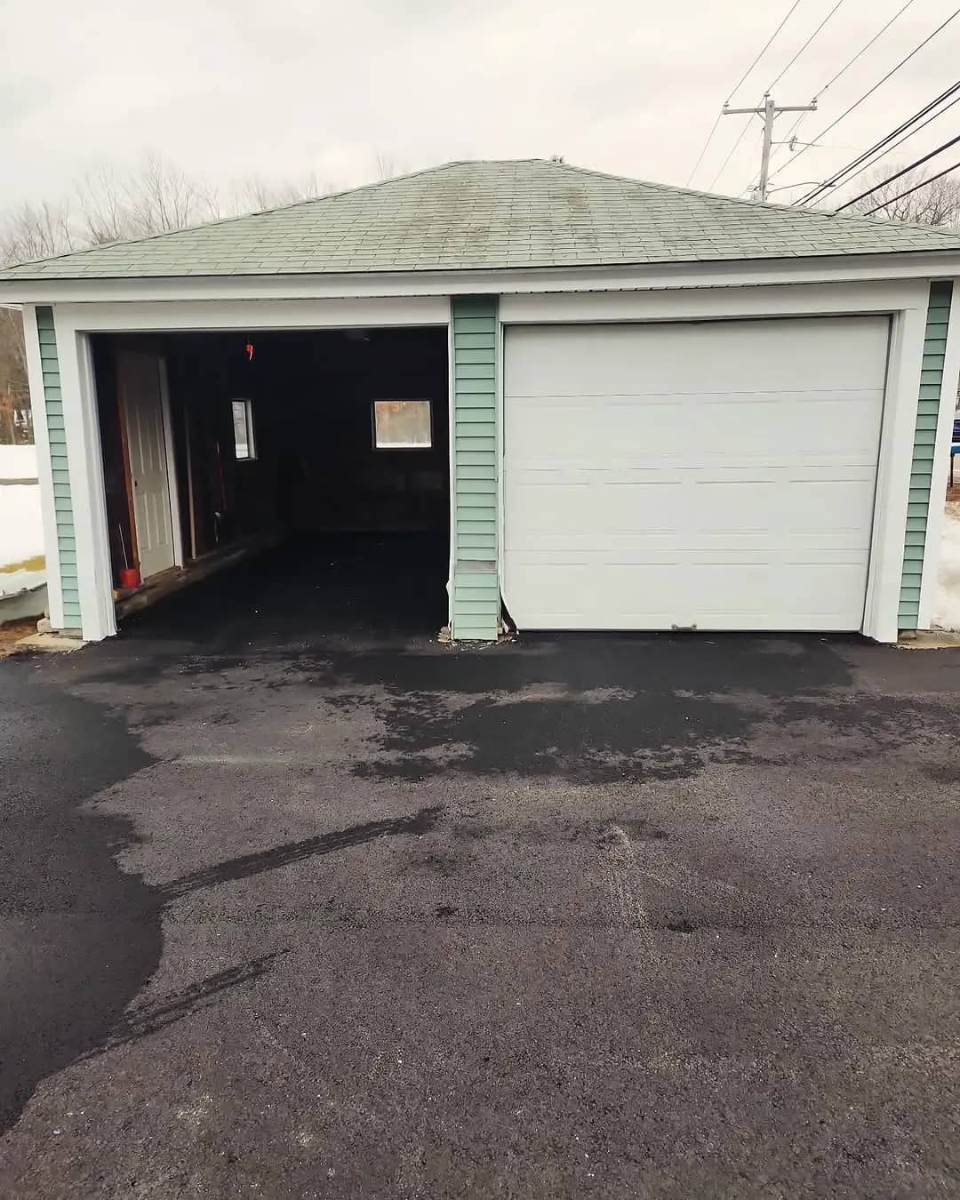 Garage door before repair